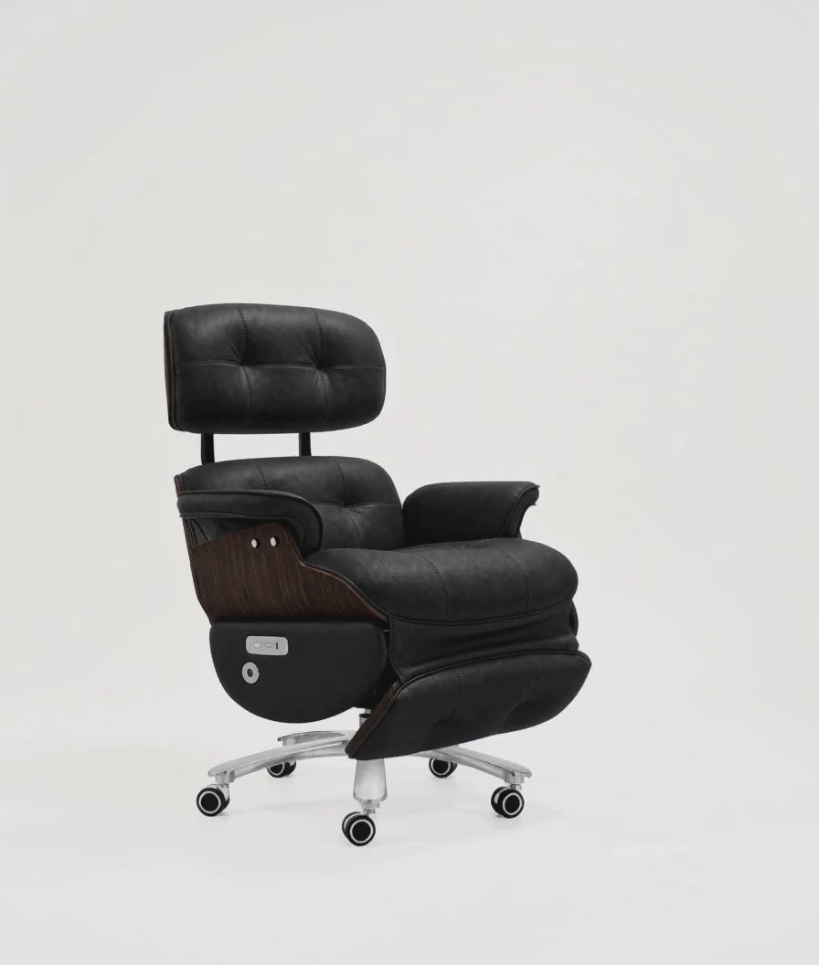 Power recline and extendable footrest demonstration on the black leather and dark walnut executive office chair